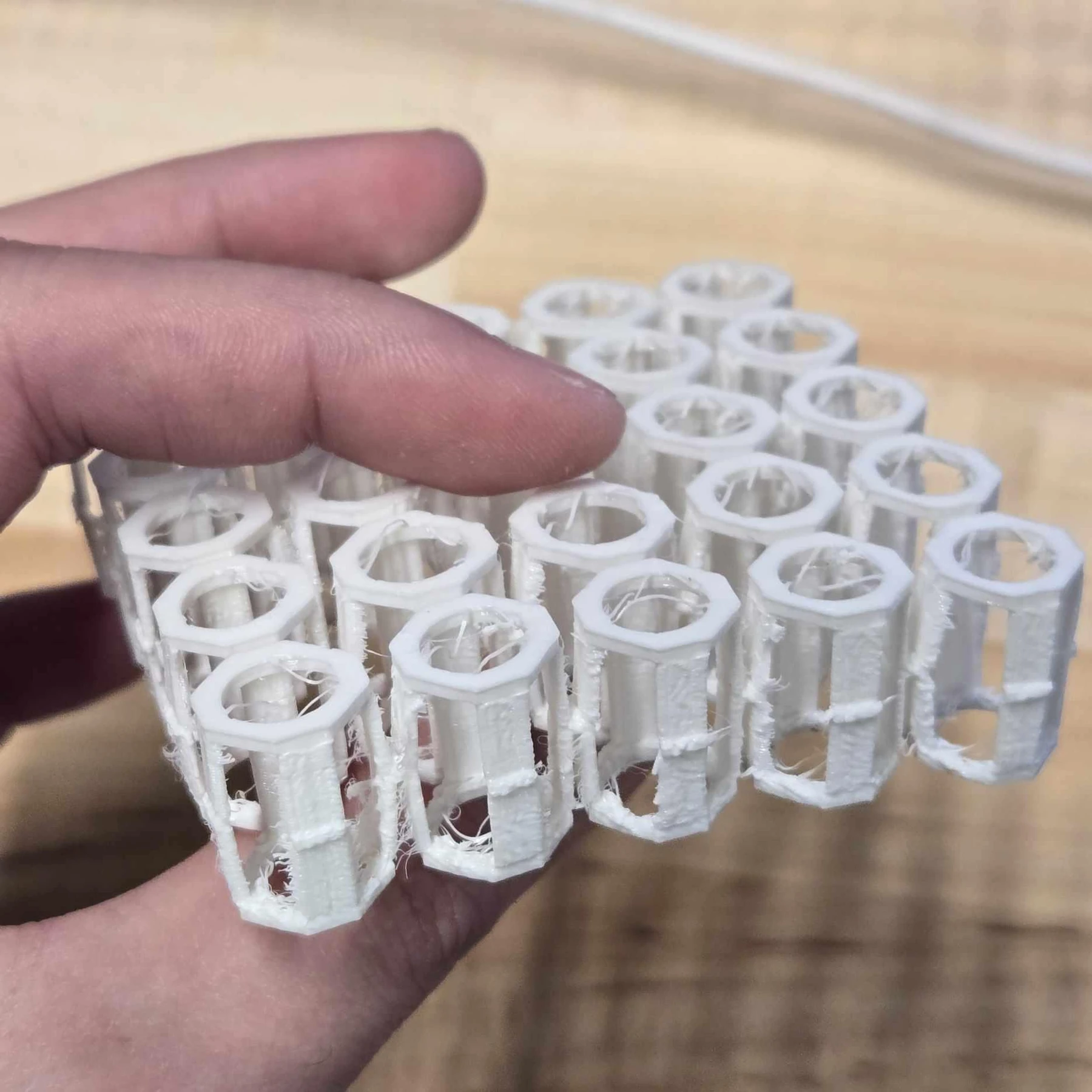 Printed holders for a five-by-five syringe-actuated array
